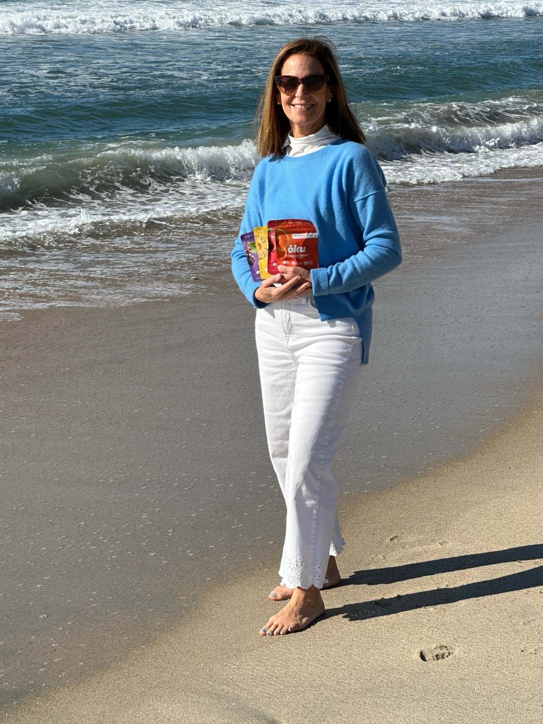 Carolyn J. Hamlet, founder of ōku, on the beach