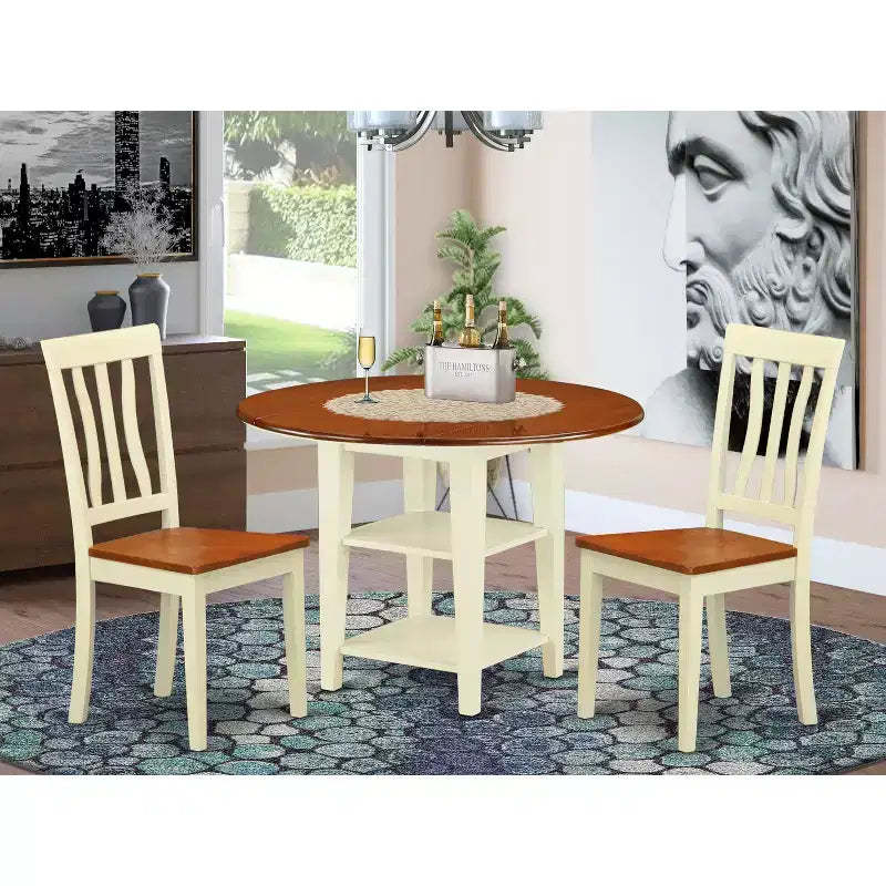 HomeStock Belmont 3 Piece Sudbury Set With One Round Dinette Table And Two Dinette Chairs With Wood Seat In A Beautiful Buttermilk and Cherry Finish