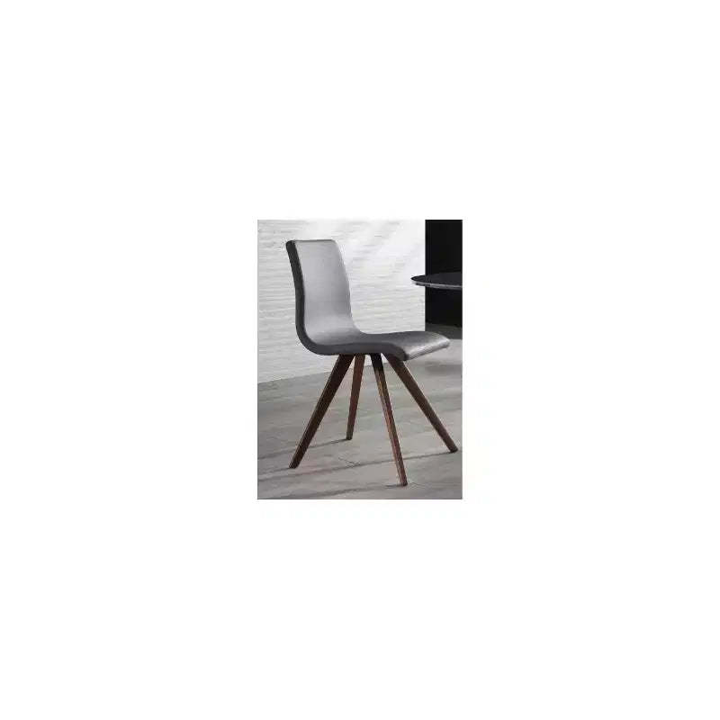 HomeStock 37 in. Black Faux Leather Dining Chair Set of 1 for a chic choice modern dcor and elegant dining experience