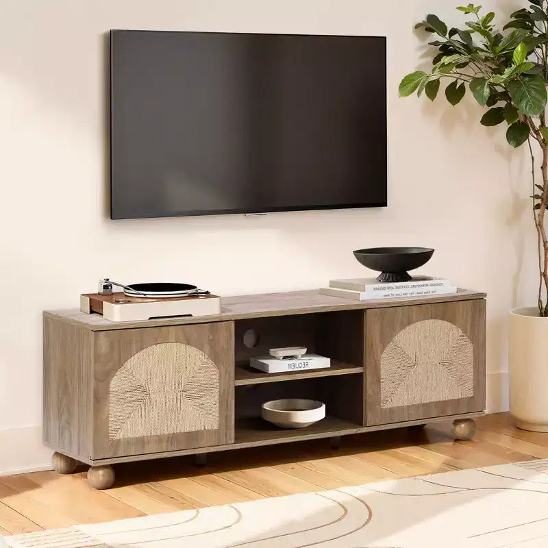 LuxenHome 55 Boho TV Stand for TVs up to 60, Natural Oak Media Console with Woven Seagrass Doors, Ball Legs Brown