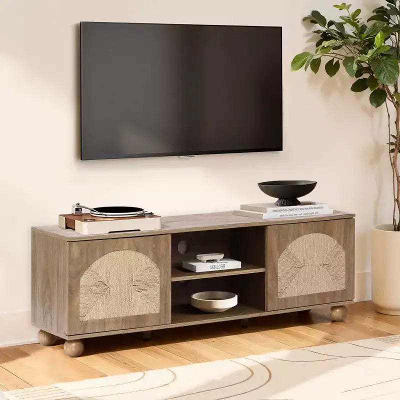 LuxenHome 55 Boho TV Stand for TVs up to 60, Natural Oak Media Console with Woven Seagrass Doors, Ball Legs Brown