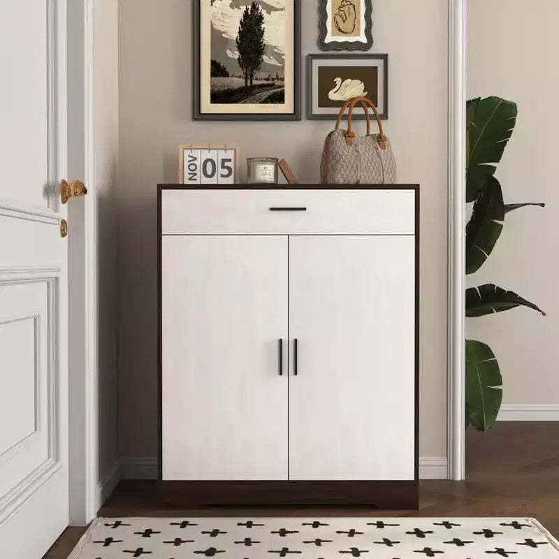 JVNOXK Freestanding wooden four-tier shoe rack with one drawer, featuring white cabinet doors and adjustable shelves. Ideal for entryways. Walnut
