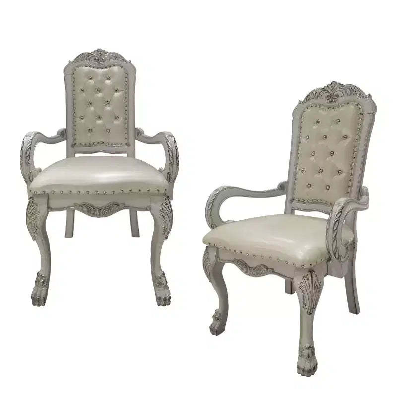 HomeRoots Set of Two Tufted White Upholstered Faux Leather And Wood Dining Arm Chairs