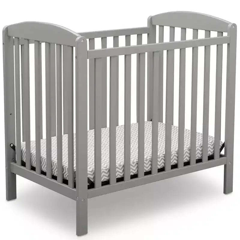 Delta Children Sprout Mini Crib With Adjustable Height and Mattress