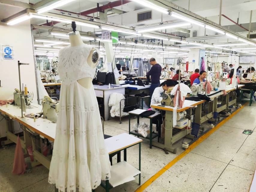 Temporary reference photo of a garment production workshop. Replace with a real photo of the Lesleyfashion factory in Suzhou.