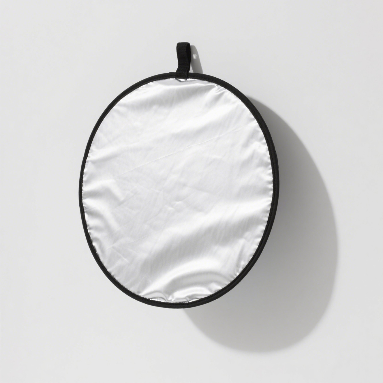 Wielofunkcyjny, składany reflektor materiałowy