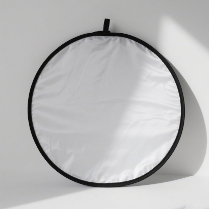 Wielofunkcyjny, składany reflektor materiałowy