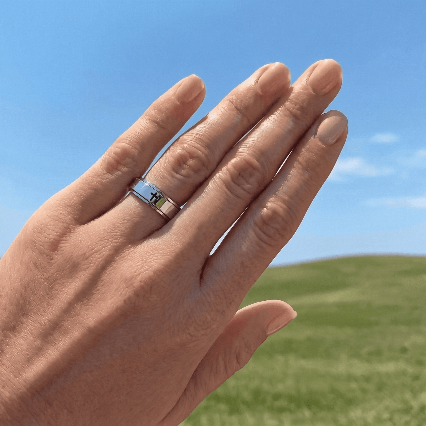 Rotating Minimalist Cross Ring