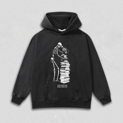 Skeleton and Cat on Book Pile T-Shirt