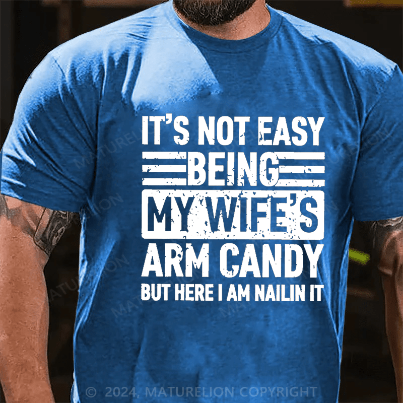 Maturelion It's Not Easy Being My Wife's Arm Candy But Here I'm Nailing It Cotton T-shirt -Maturelion