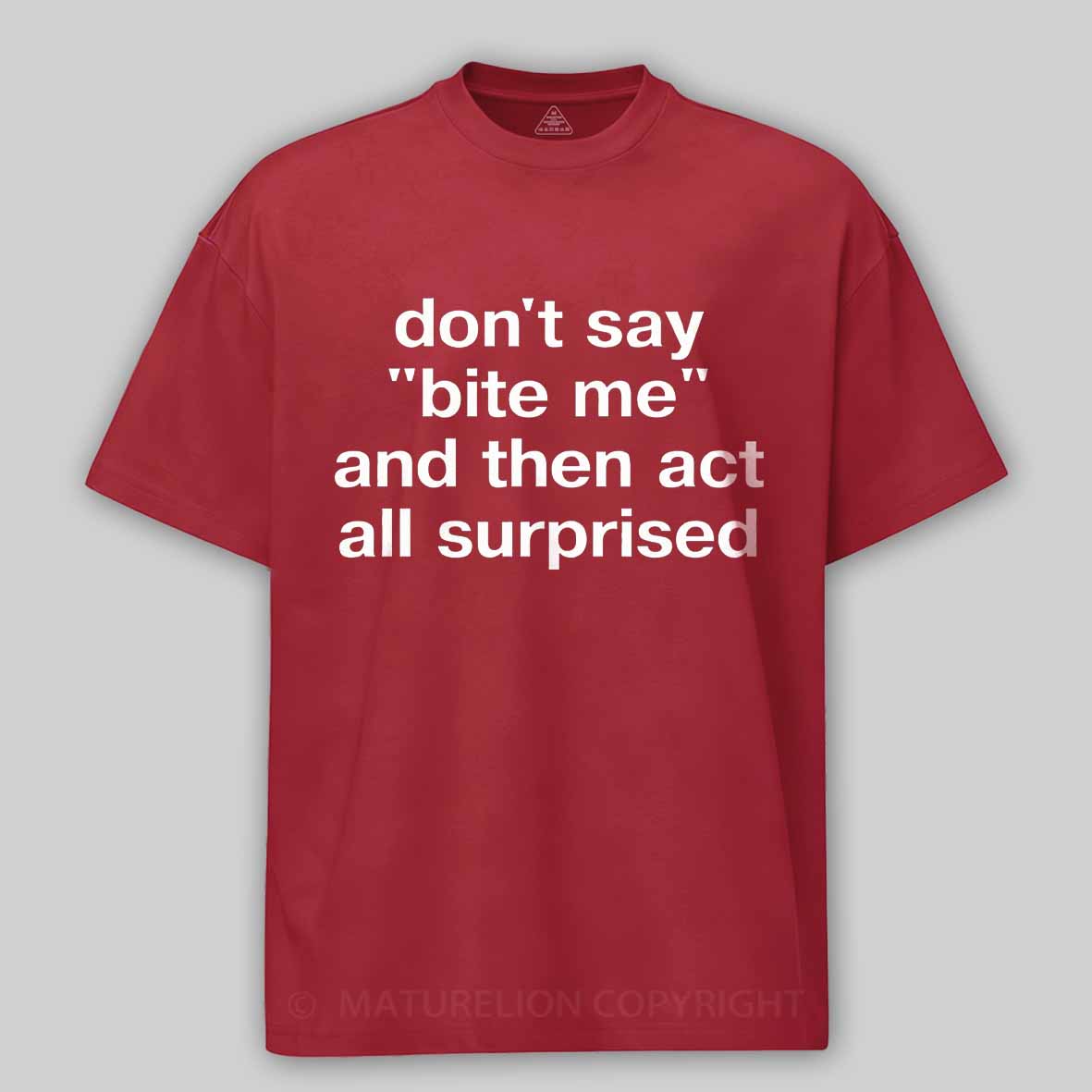 Maturelion "don't say 'bite me' and then act all surprised" in plain white letters Cotton T-shirt
