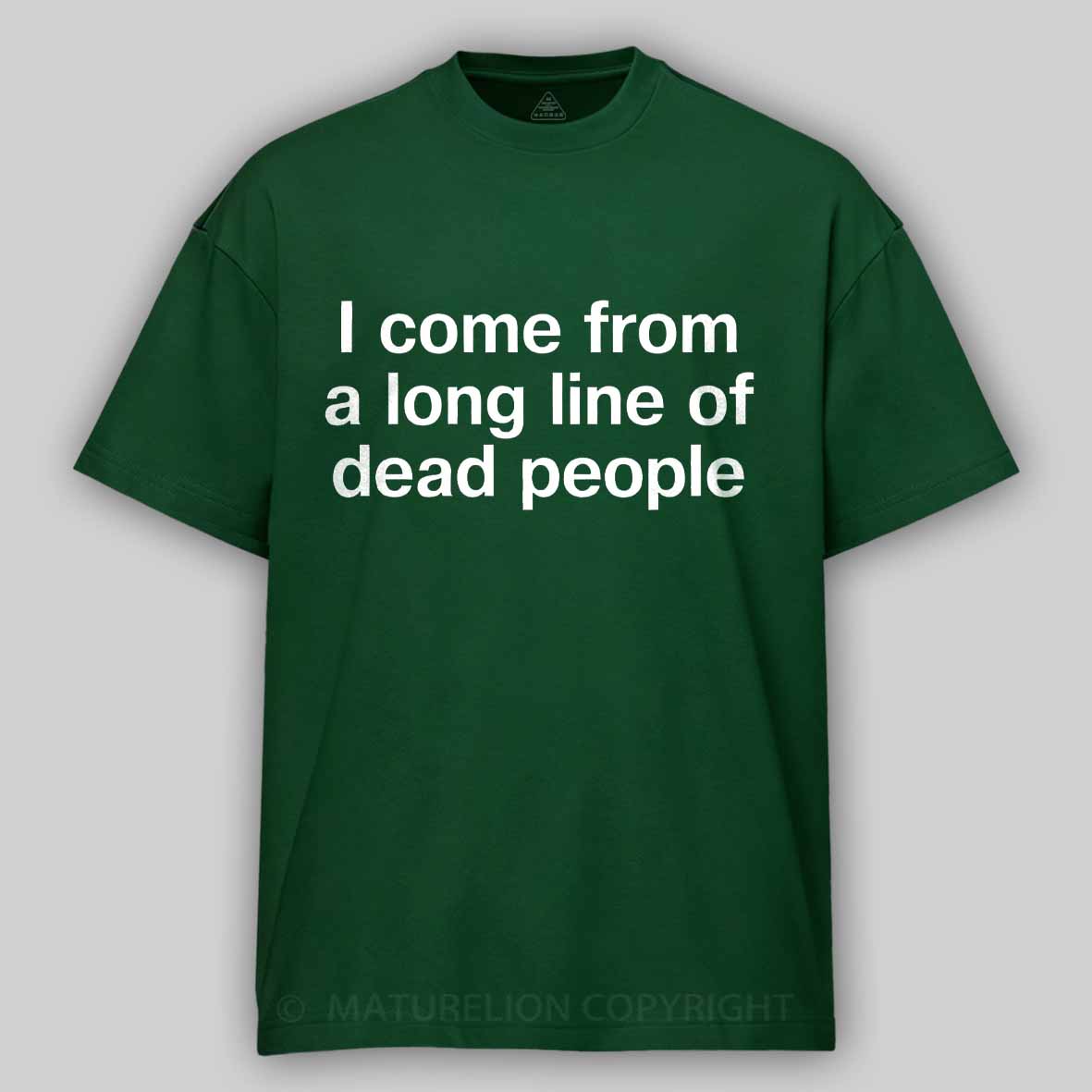 Maturelion I come from a long line of dead people" in plain white letters - dad jokes FTW Cotton T-shirt