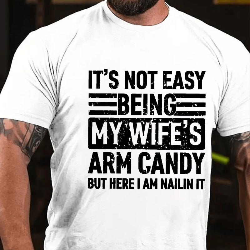Maturelion It's Not Easy Being My Wife's Arm Candy But Here I'm Nailing It Cotton T-shirt -Maturelion