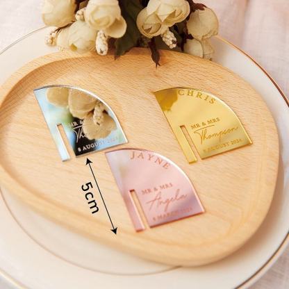 Personalized laser-engraved mirrored acrylic arched beverage labels, stirrers, place cards, wedding decorations, tableware, and party ornaments.