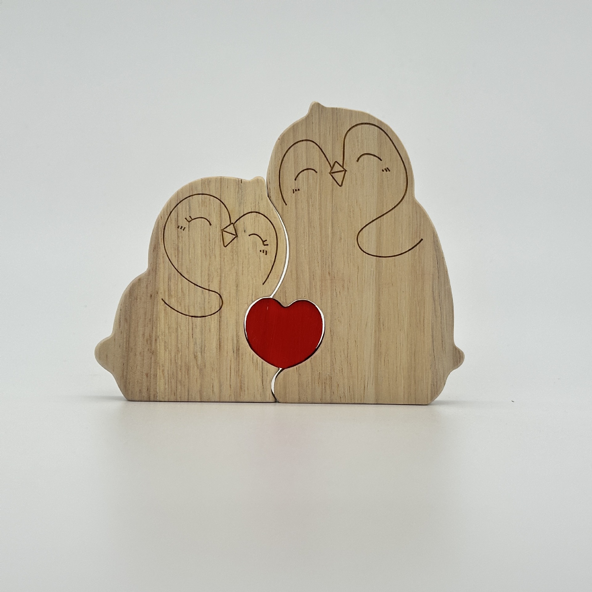 Heart-shaped puzzle figurine, made of natural wood, featuring a red penguin heart design. A perfect gift for couples, home decor, or family keepsakes - Birthday present for a family member.-TailorAura