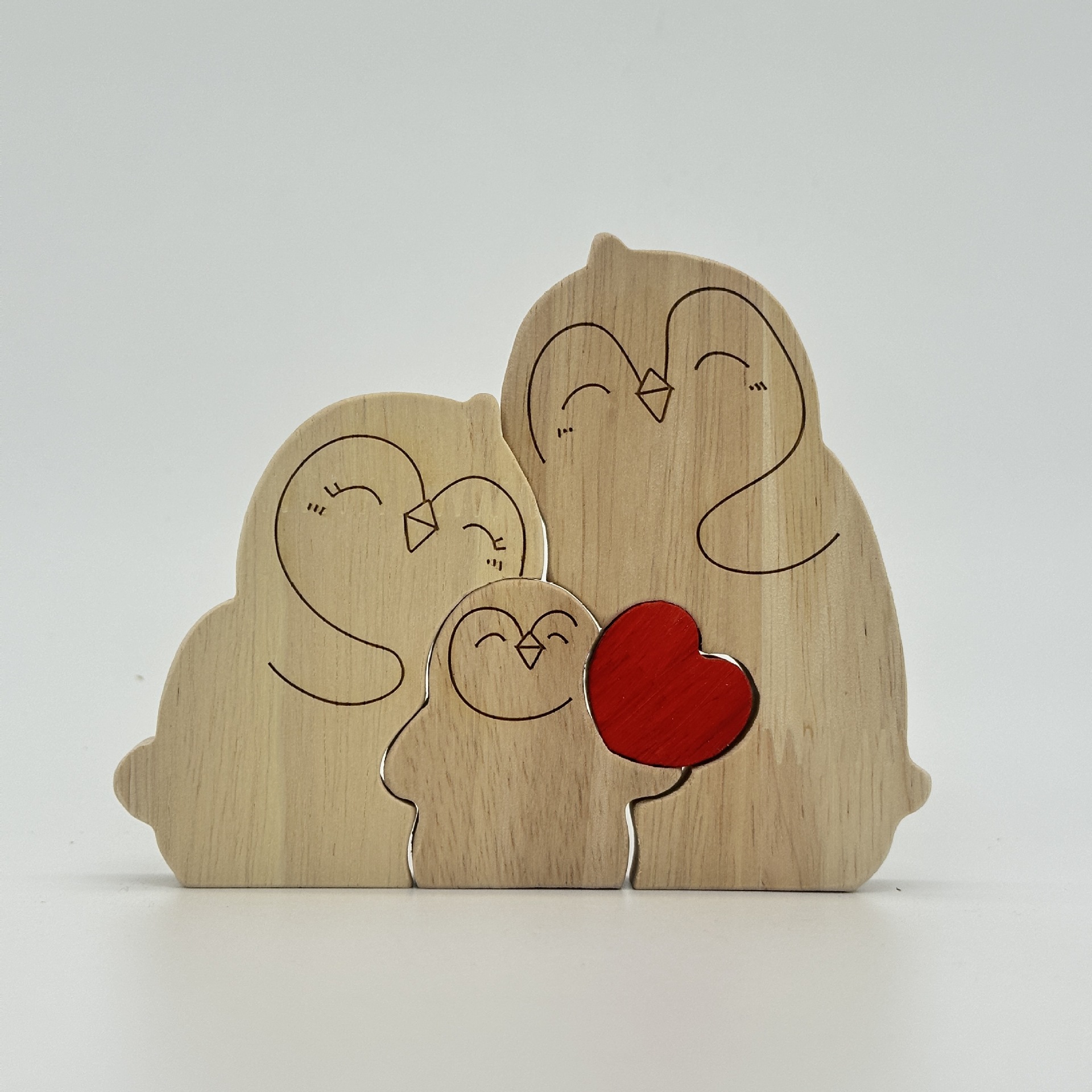 Heart-shaped puzzle figurine, made of natural wood, featuring a red penguin heart design. A perfect gift for couples, home decor, or family keepsakes - Birthday present for a family member.-TailorAura