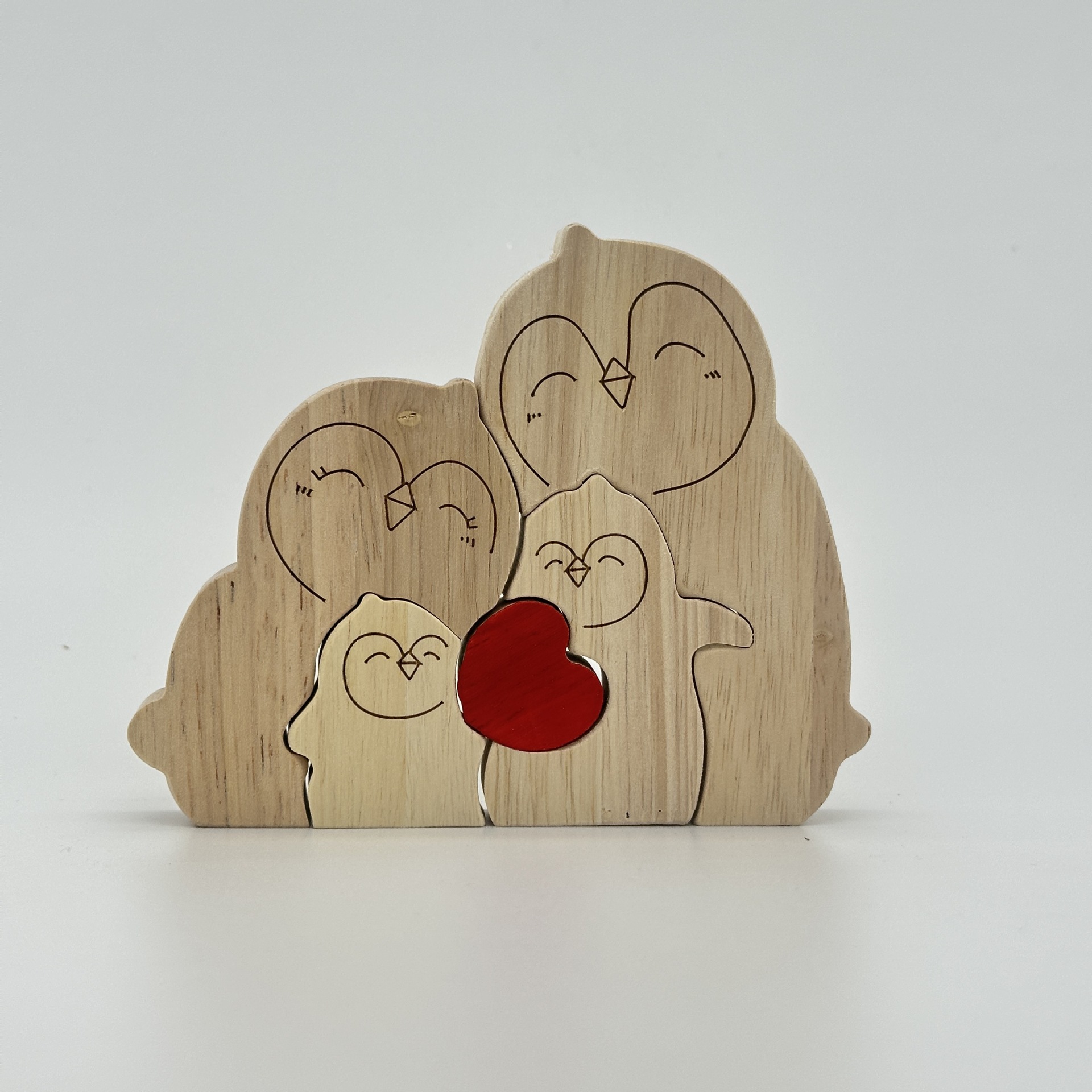 Heart-shaped puzzle figurine, made of natural wood, featuring a red penguin heart design. A perfect gift for couples, home decor, or family keepsakes - Birthday present for a family member.-TailorAura