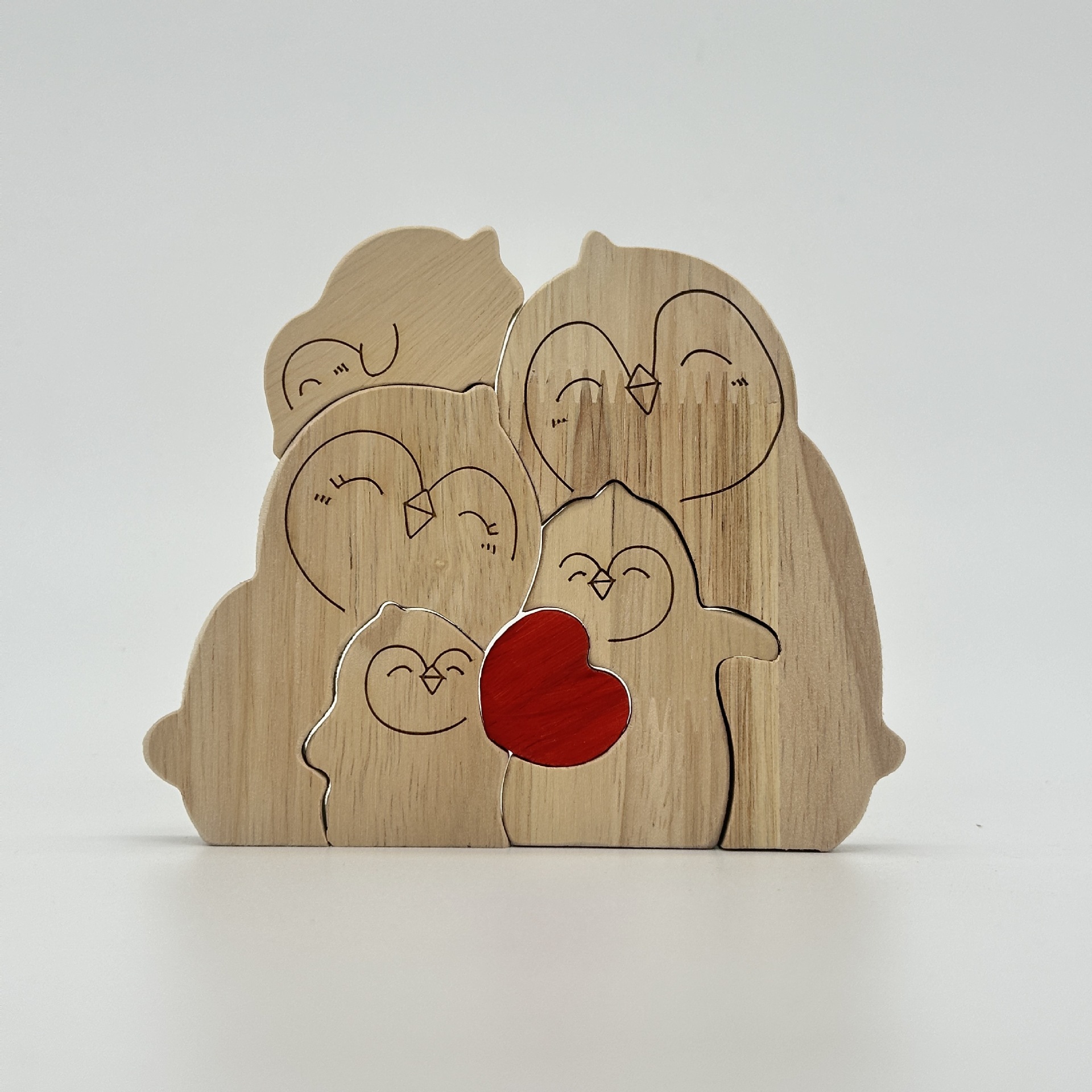 Heart-shaped puzzle figurine, made of natural wood, featuring a red penguin heart design. A perfect gift for couples, home decor, or family keepsakes - Birthday present for a family member.-TailorAura