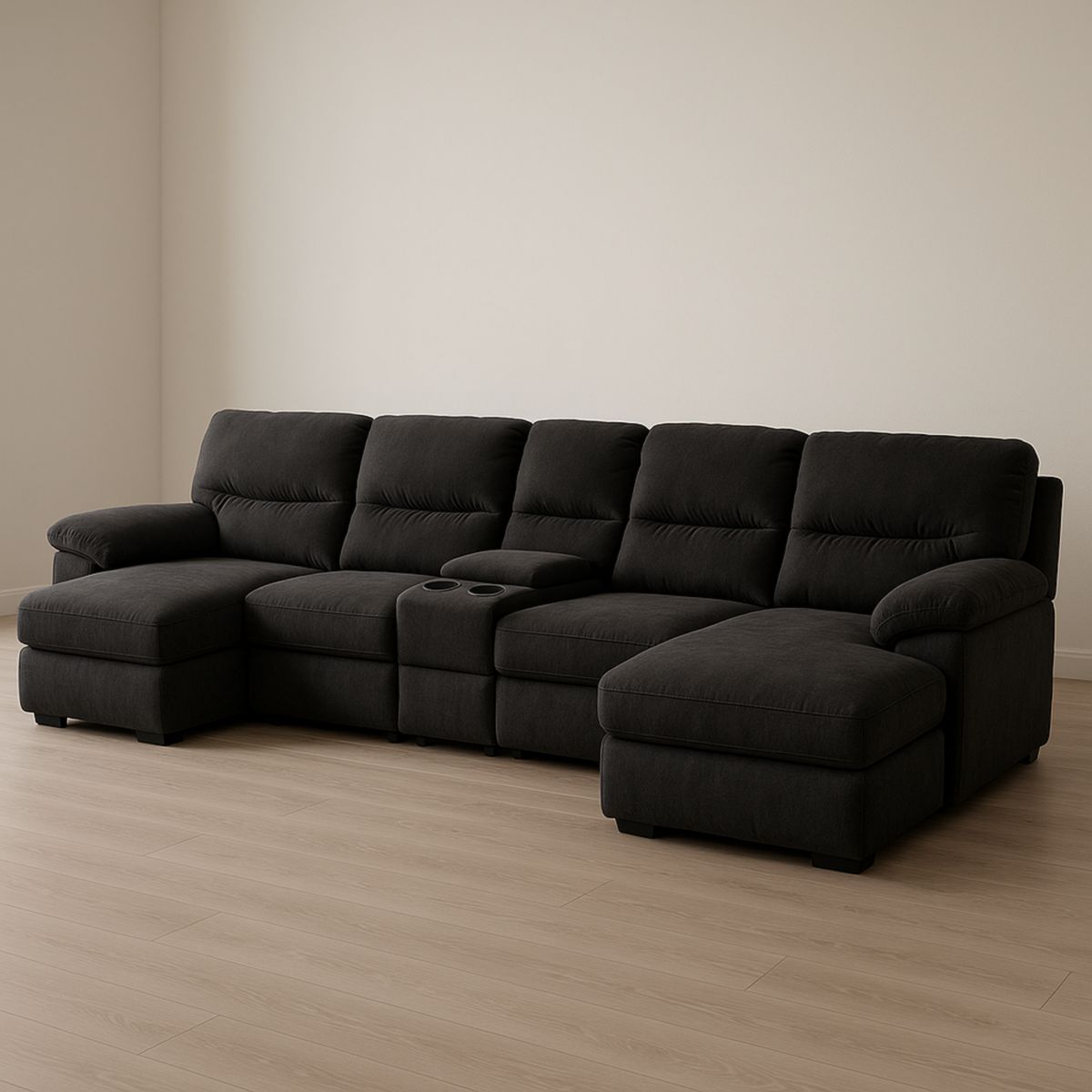 Mørk grå hjørnesofa i polyester med sjeselong og koppholder