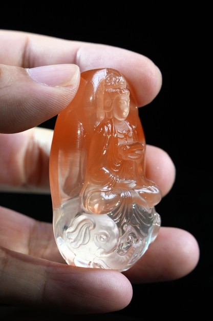Guanyin theme, red rabbit fur crystal carving.Masterpieces
