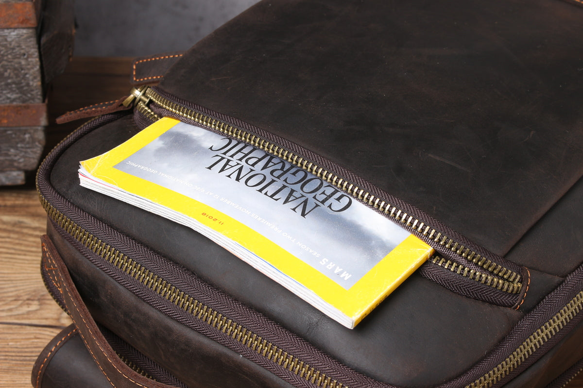 leather computer backpack with smart side-pockets and anti-theft back pocket