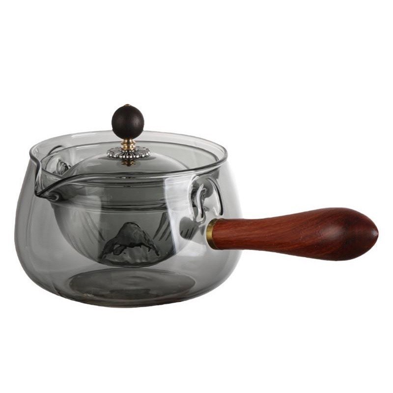 Hand-blown glass teapot with built-in infuser, suitable for use over an open flame
