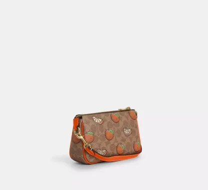 Nolita 19 In Signature Canvas With Orange Print