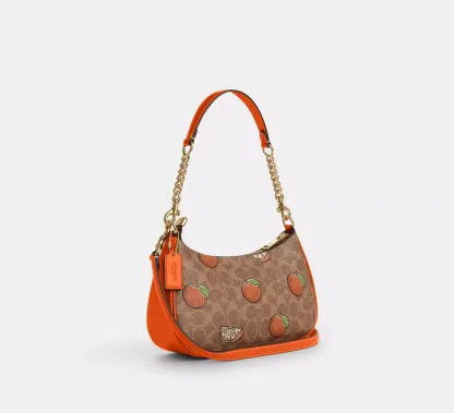 Teri Shoulder Bag In Signature Canvas With Orange Print