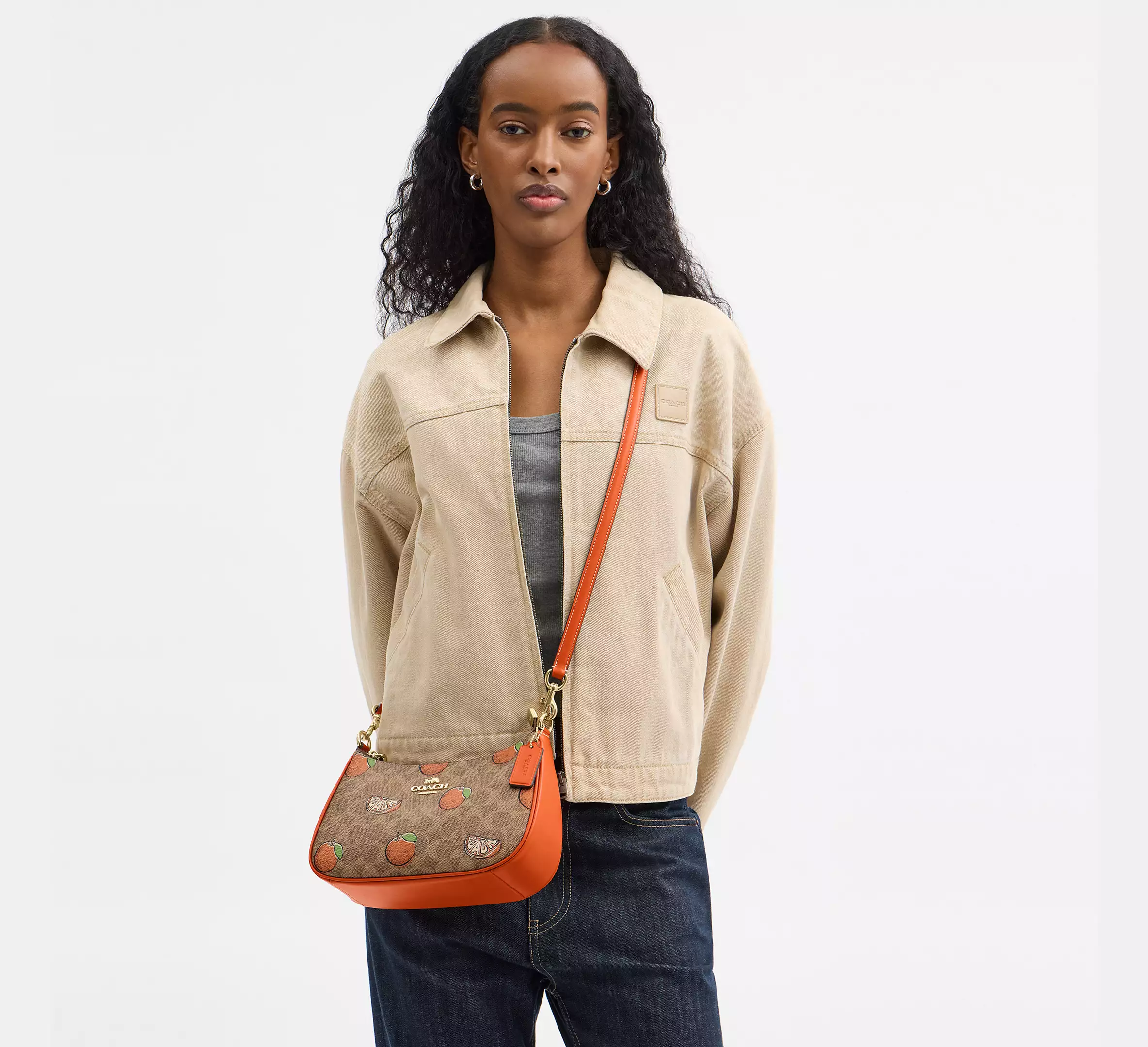 Teri Shoulder Bag In Signature Canvas With Orange Print