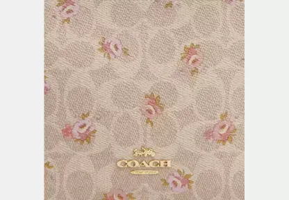 Slim Crossbody Bag In Signature Canvas With Floral Print