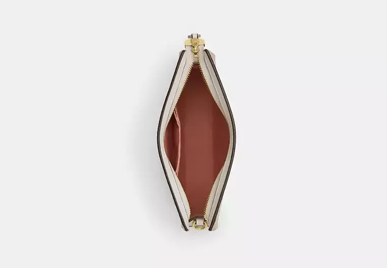 Slim Crossbody Bag In Signature Canvas With Floral Print