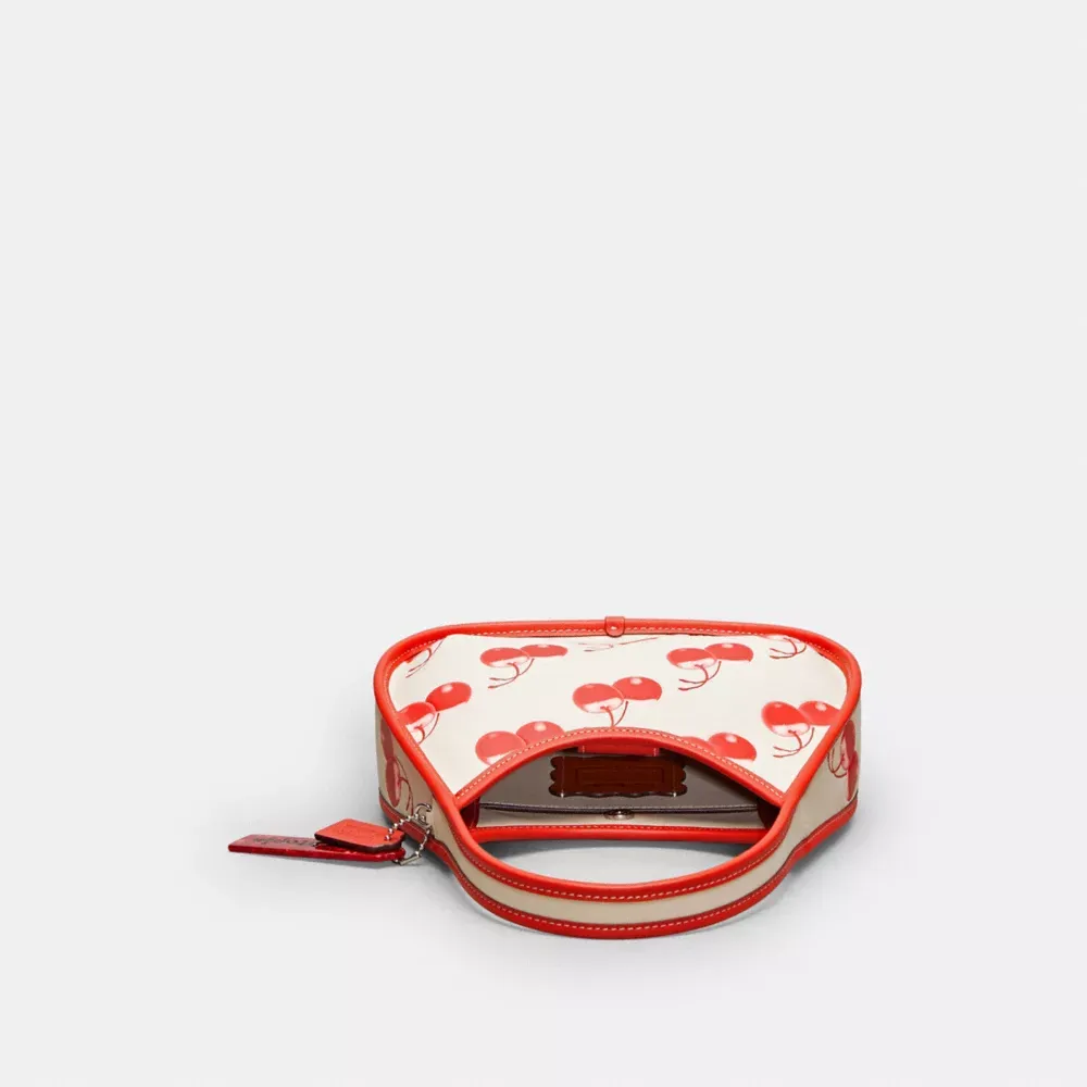 Ergo Bag In Coachtopia Leather With Cherry Print