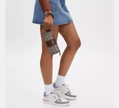 Nolita Barrel Bag In Signature Canvas