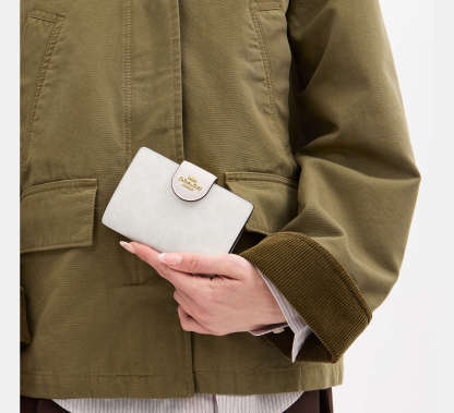 Medium Corner Zip Wallet In Signature Canvas