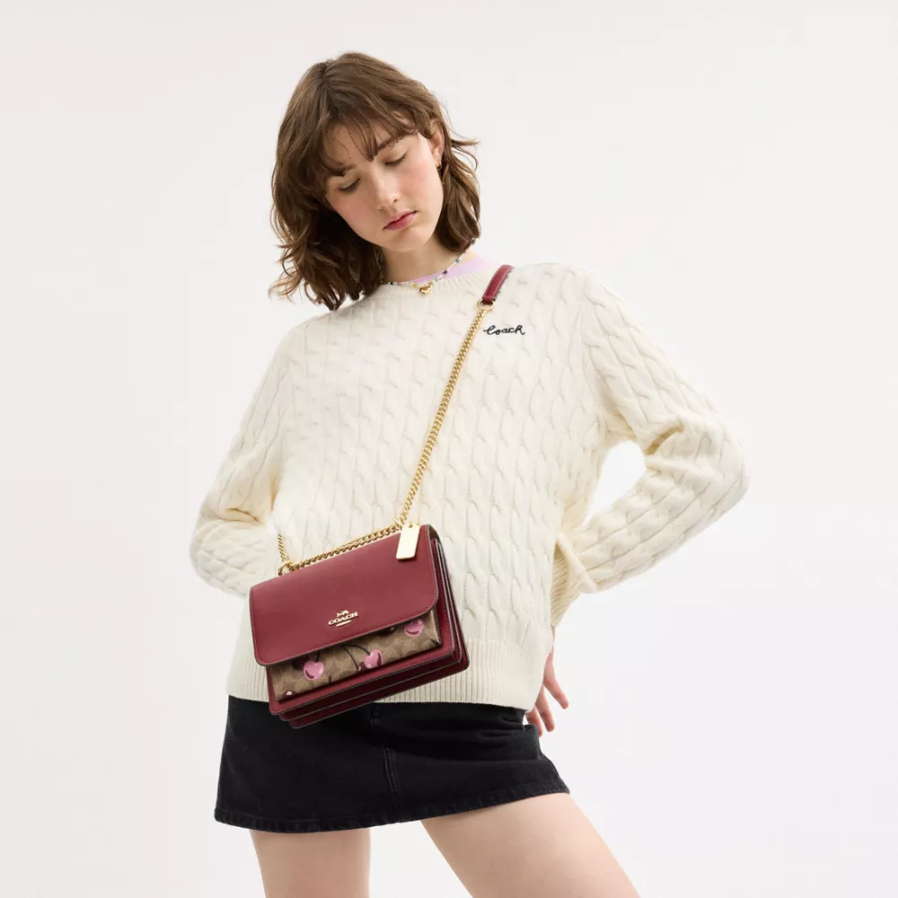 Klare Crossbody Bag In Signature Canvas With Cherry Print