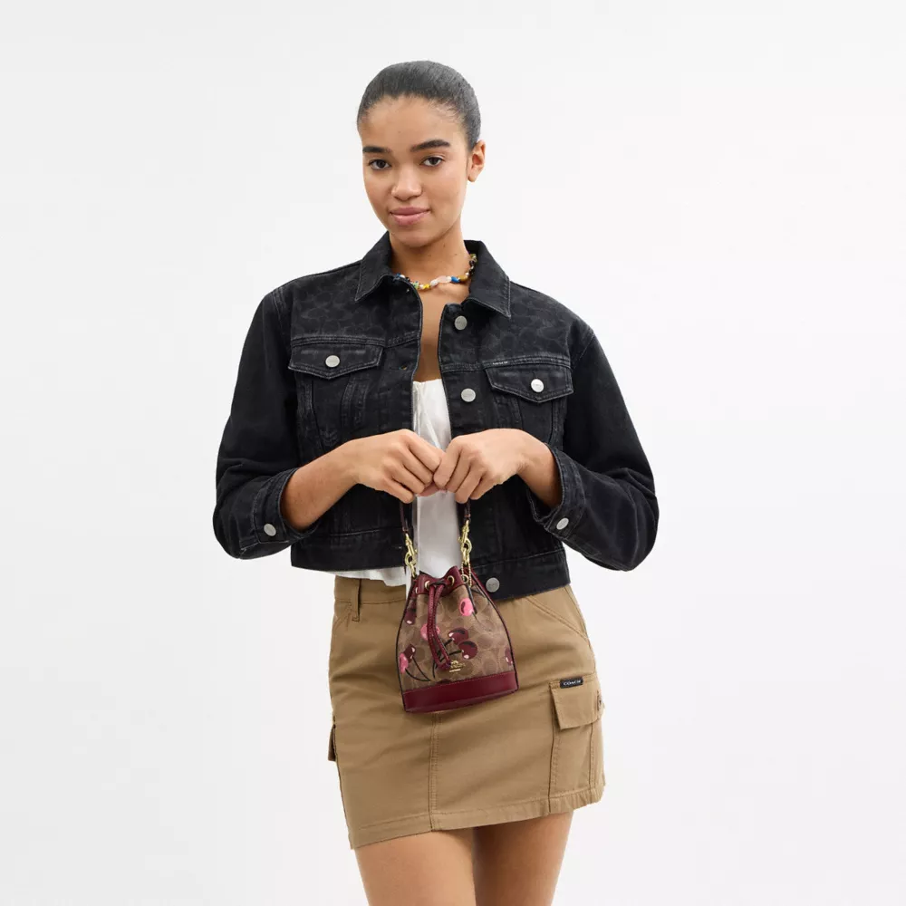 Mini Bucket Bag In Signature Canvas With Cherry Print