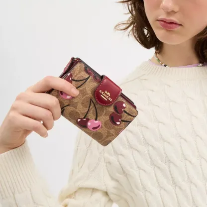 Medium Corner Zip Wallet In Signature Canvas With Cherry Print