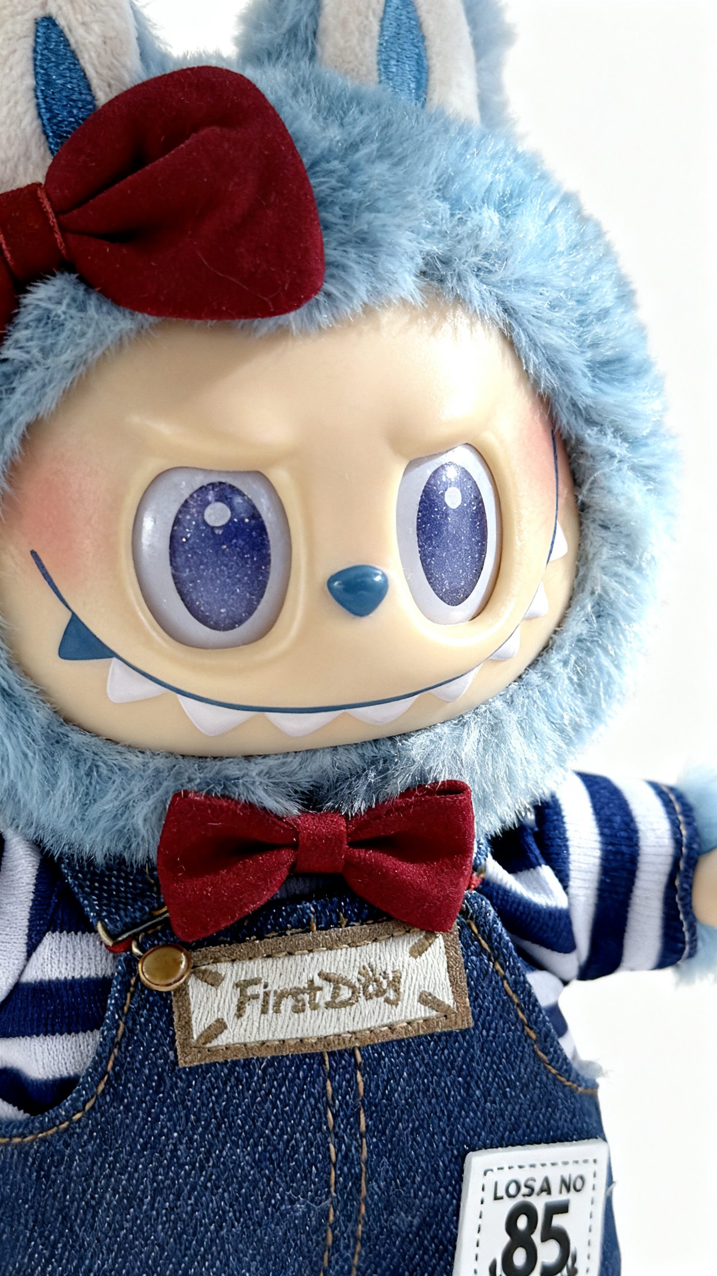 red bow, blue and white shirt and jeans suit