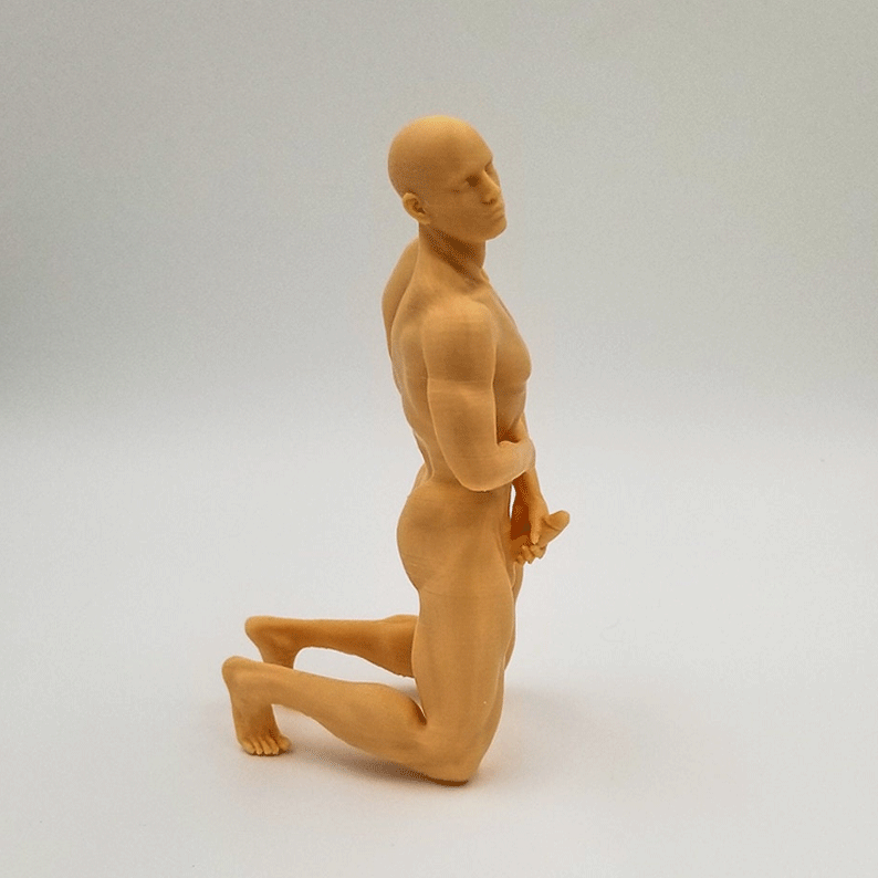 Dynamic Male Kneeling Sculpture