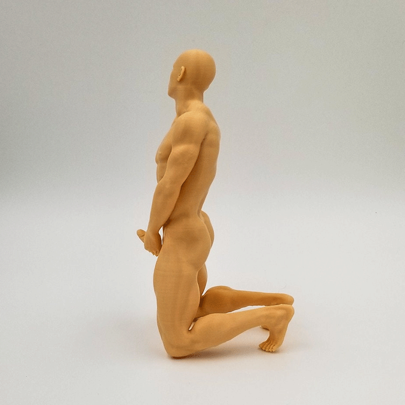 Dynamic Male Kneeling Sculpture