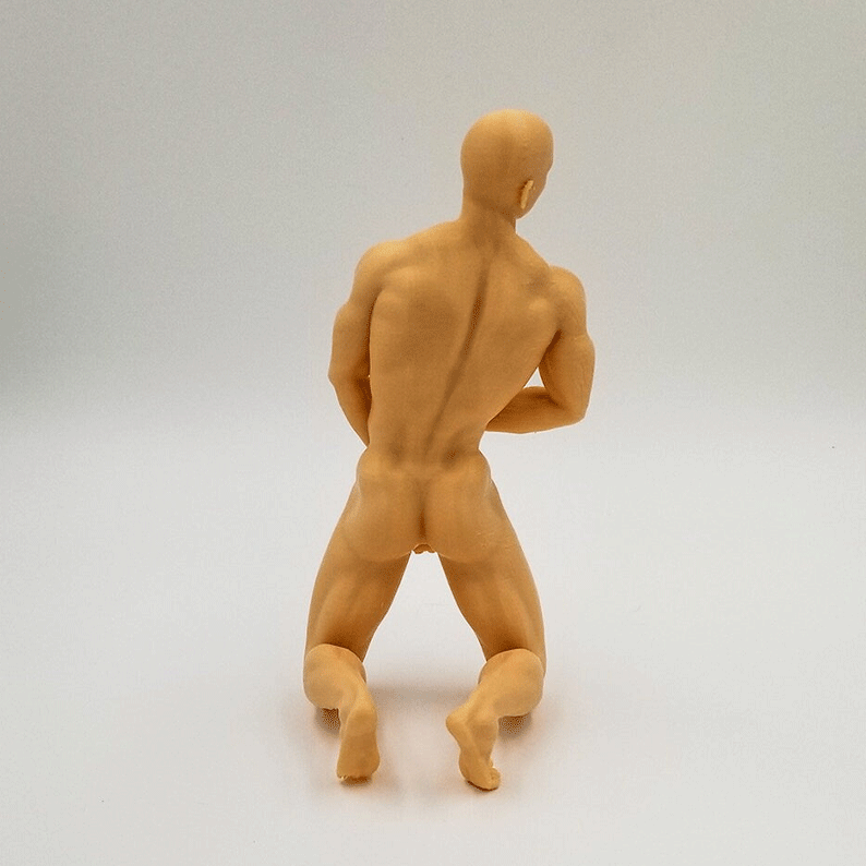 Dynamic Male Kneeling Sculpture