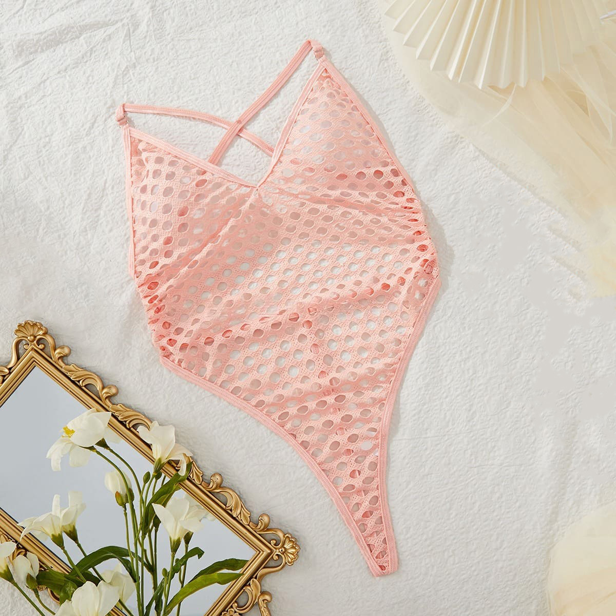 Strappy, sheer, one-piece mesh bodysuit