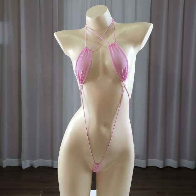 Sexy strappy women's lingerie set, seductive bodysuit.