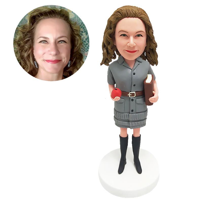 customised bobblehead figure teacher holding a book and an apple
