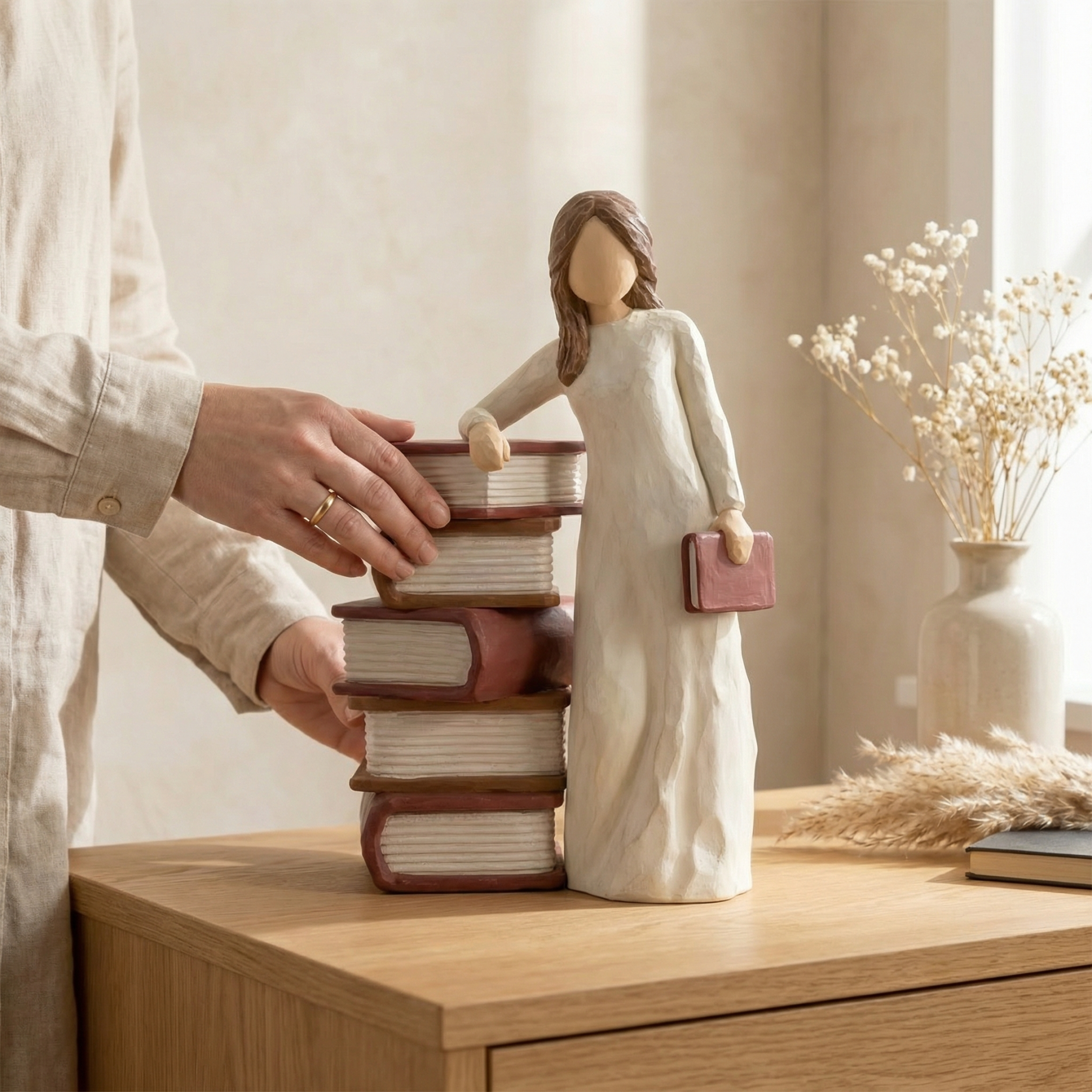 Charming Girl Holding Book Figurines