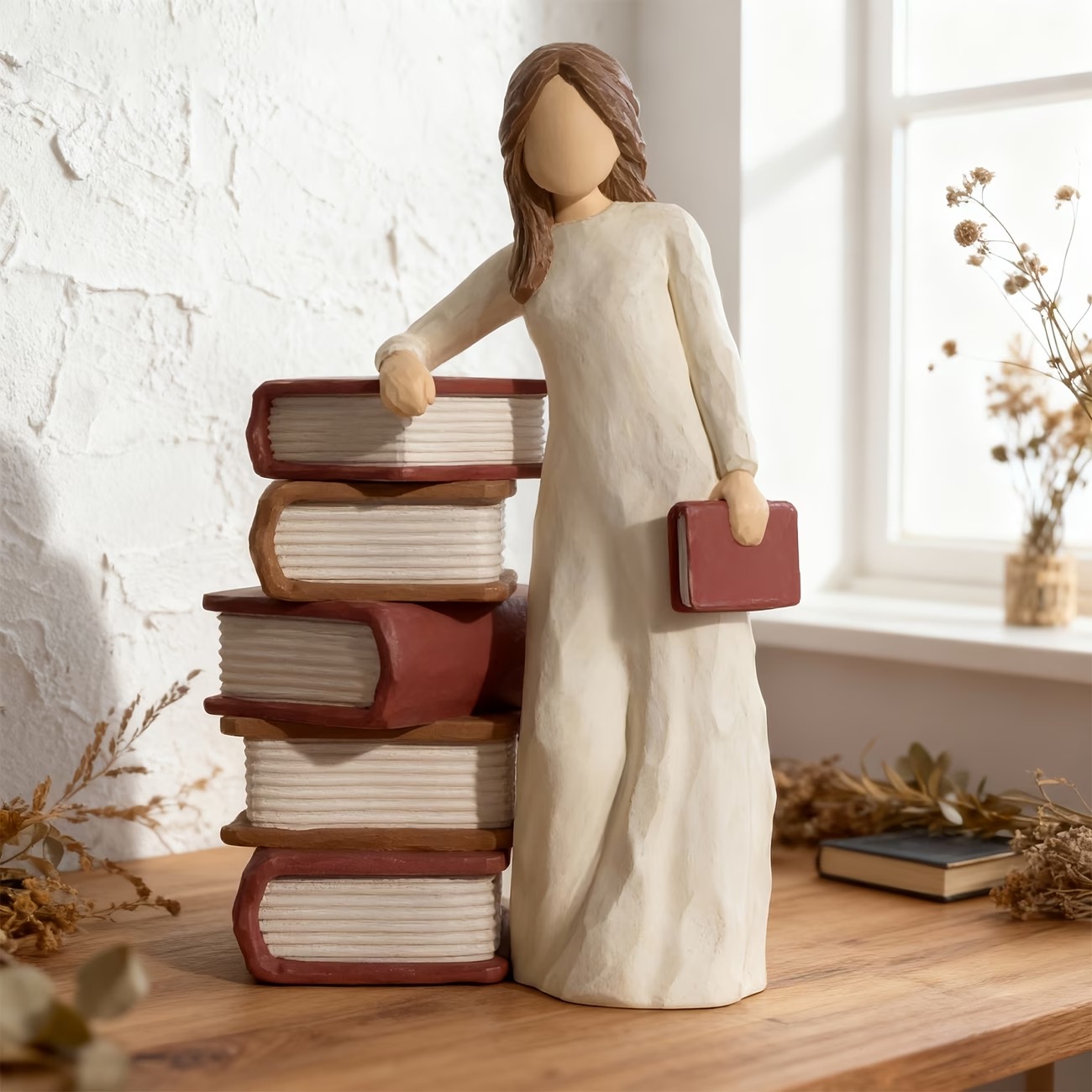 Charming Girl Holding Book Figurines