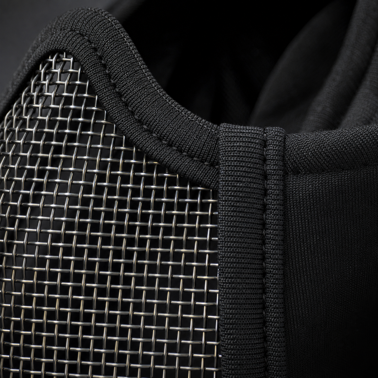 Fabric stitching and steel-mesh panel details