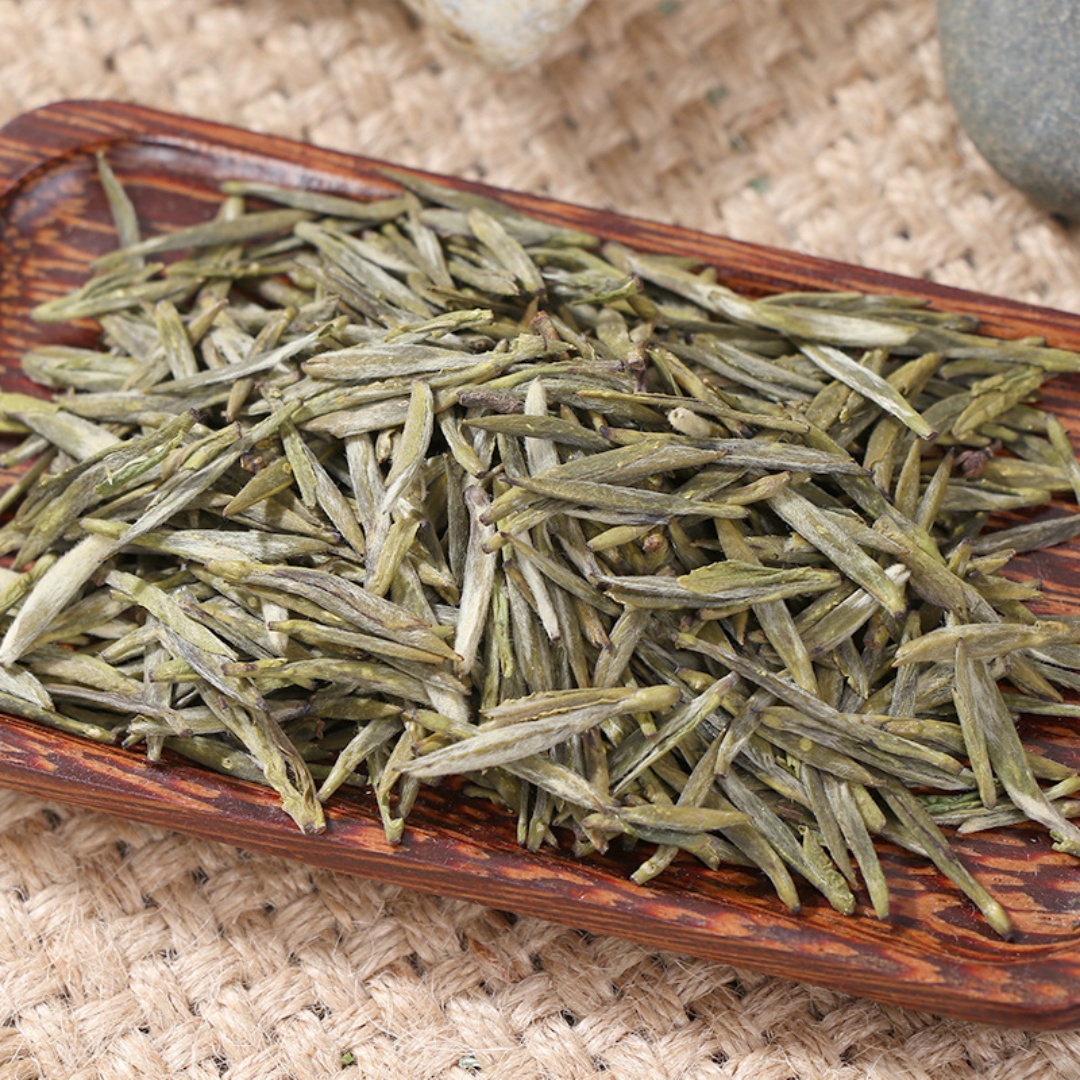 a dish of yellow tea leaves