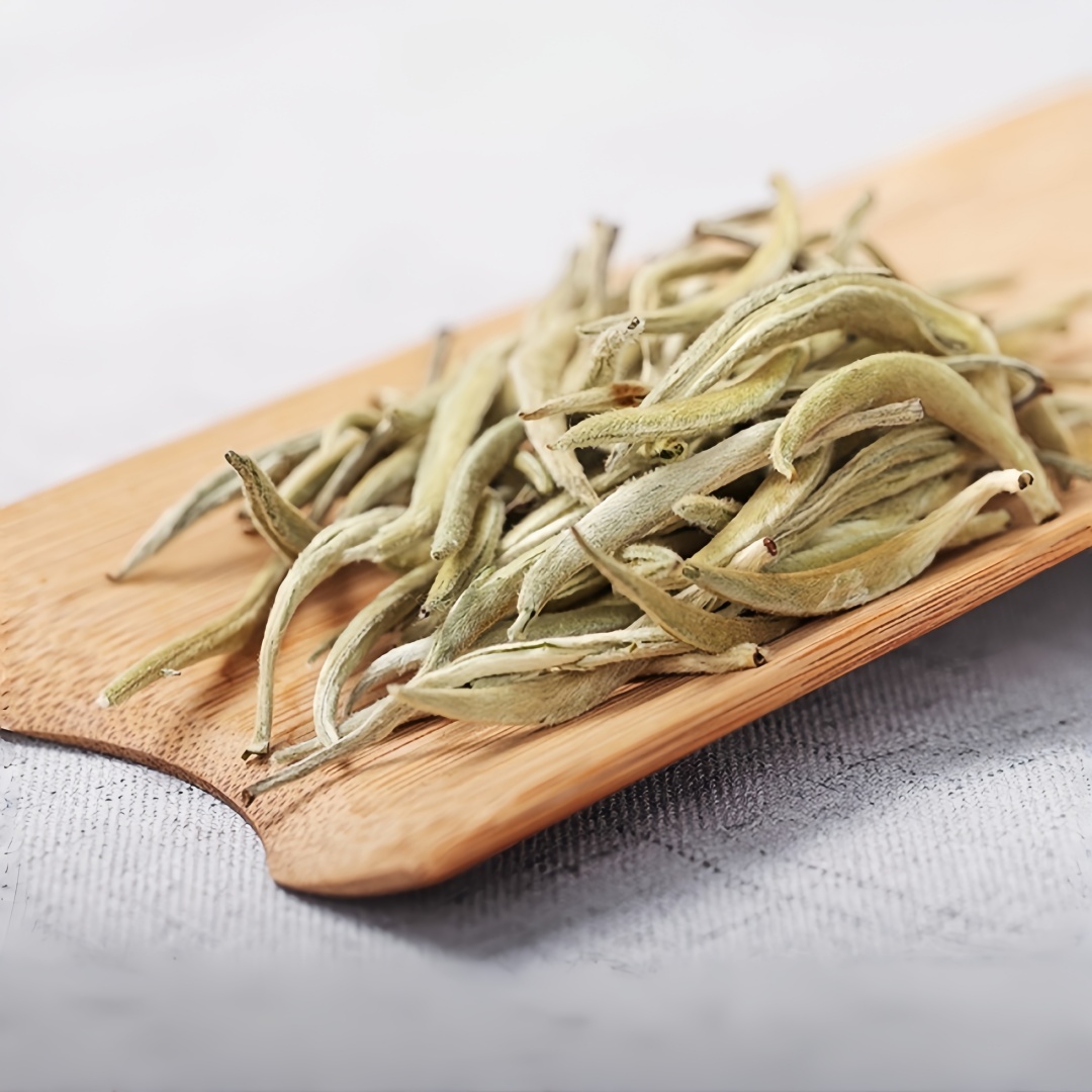 A pile of Silver Needle white tea leaves