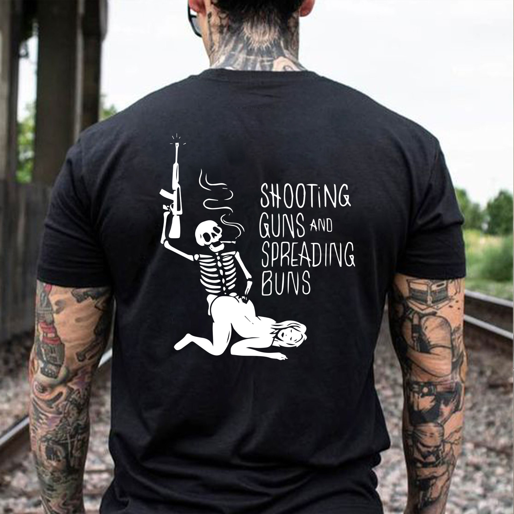 SHOOTING GUNS AND SPREADING BUNS Skull with Sexy Lady Print T-shirt